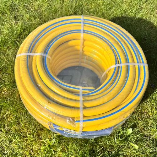 Yellow reinforced heavy duty professional garden hose for high water pressure.